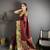 maroon silk blend zari woven saree with unstitched blouse piece.