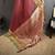 maroon silk blend zari woven saree with unstitched blouse piece.