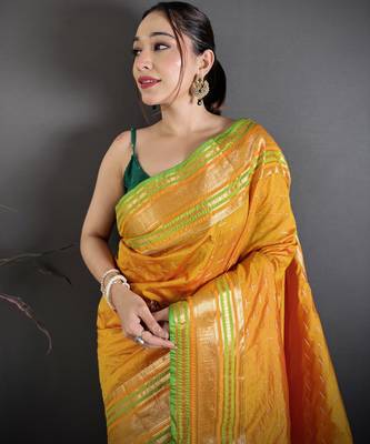 mustard silk blend zari woven saree with unstitched blouse piece. 1