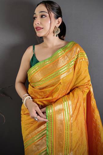 mustard silk blend zari woven saree with unstitched blouse piece.