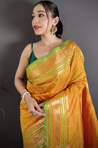 mustard silk blend zari woven saree with unstitched blouse piece.