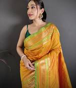 mustard silk blend zari woven saree with unstitched blouse piece.