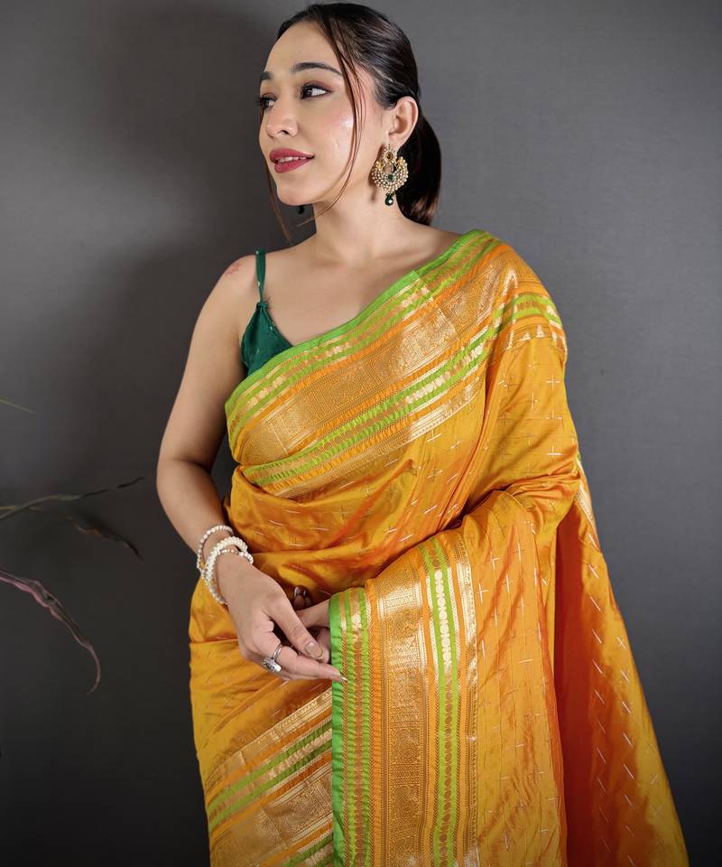 mustard silk blend zari woven saree with unstitched blouse piece.