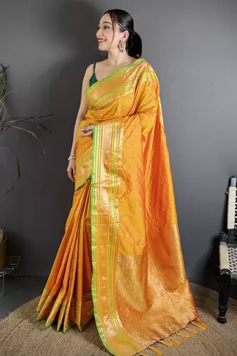 mustard silk blend zari woven saree with unstitched blouse piece.