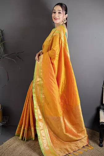 mustard silk blend zari woven saree with unstitched blouse piece.