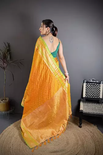 mustard silk blend zari woven saree with unstitched blouse piece.
