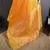 mustard silk blend zari woven saree with unstitched blouse piece.