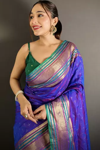 purple silk blend zari woven saree with unstitched blouse piece.