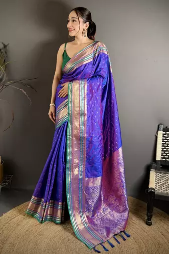 purple silk blend zari woven saree with unstitched blouse piece.