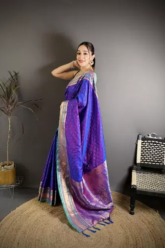 purple silk blend zari woven saree with unstitched blouse piece.