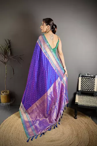 purple silk blend zari woven saree with unstitched blouse piece.