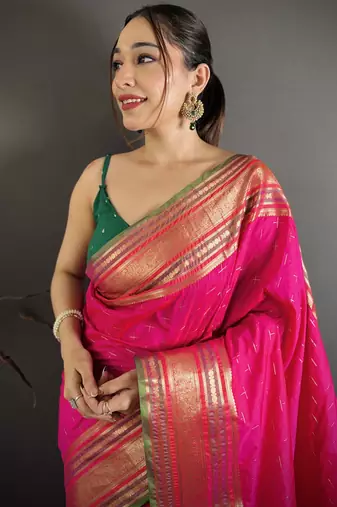 rani silk blend zari woven saree with unstitched blouse piece.