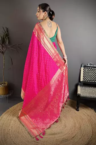 rani silk blend zari woven saree with unstitched blouse piece.