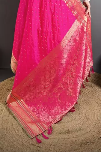 rani silk blend zari woven saree with unstitched blouse piece.