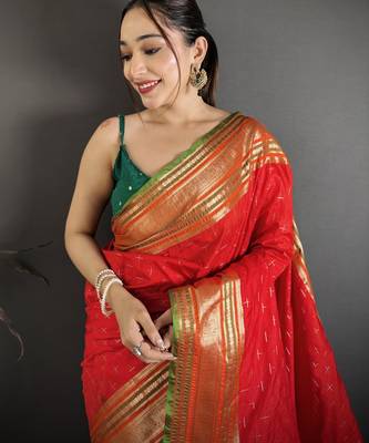 red silk blend zari woven saree with unstitched blouse piece. 1