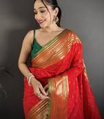 red silk blend zari woven saree with unstitched blouse piece.