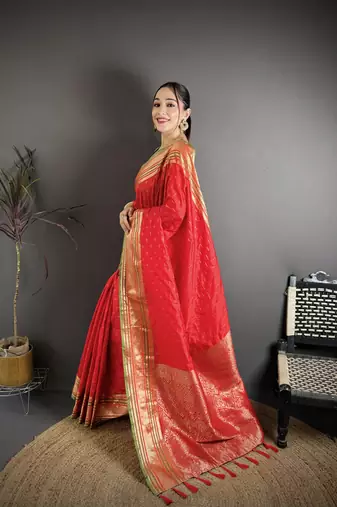 red silk blend zari woven saree with unstitched blouse piece.
