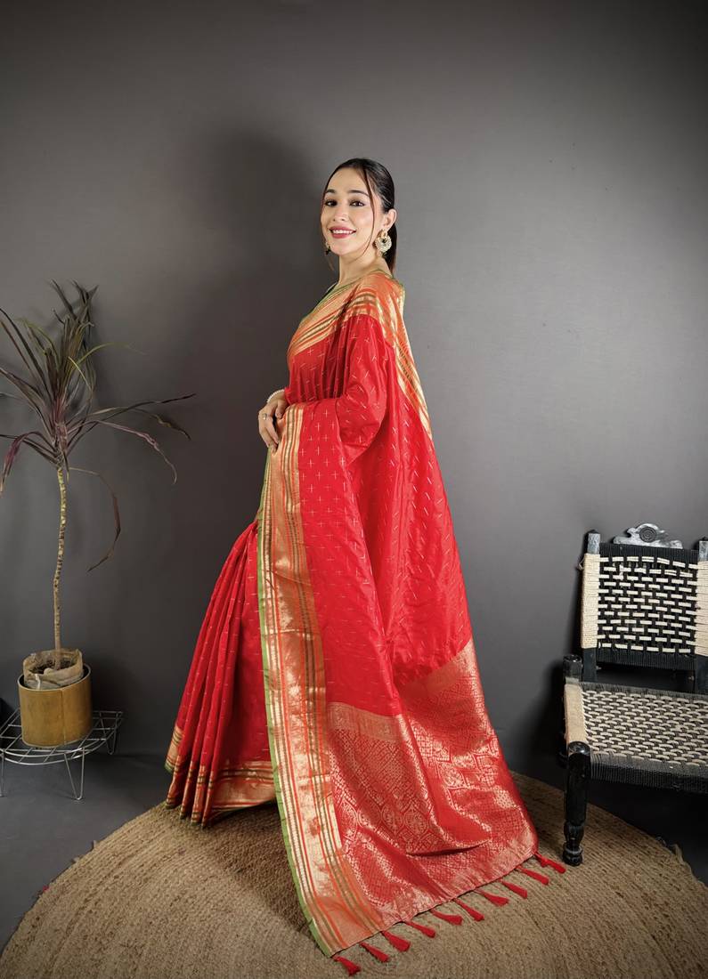 red silk blend zari woven saree with unstitched blouse piece.