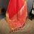 red silk blend zari woven saree with unstitched blouse piece.