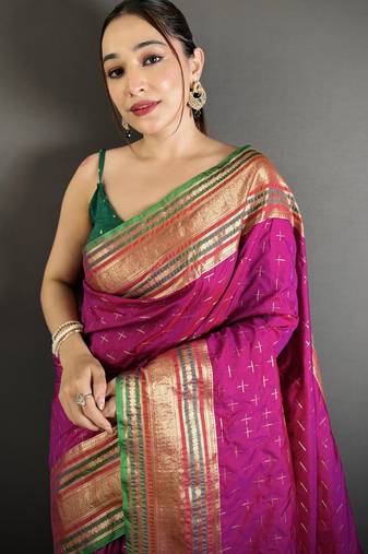 wine silk blend zari woven saree with unstitched blouse piece.