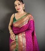 wine silk blend zari woven saree with unstitched blouse piece.