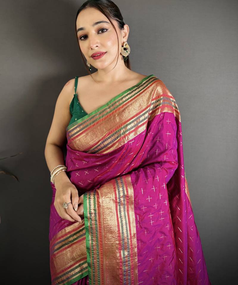 wine silk blend zari woven saree with unstitched blouse piece.