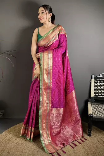wine silk blend zari woven saree with unstitched blouse piece.