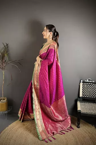 wine silk blend zari woven saree with unstitched blouse piece.