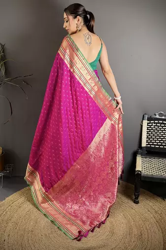 wine silk blend zari woven saree with unstitched blouse piece.