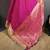 wine silk blend zari woven saree with unstitched blouse piece.