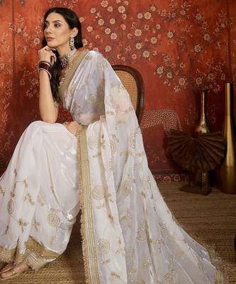 Cream tissue satin embroidered sequin saree with unstitched blouse piece. 1