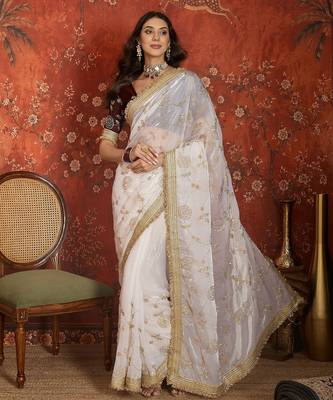 Cream tissue satin embroidered sequin saree with unstitched blouse piece. 2