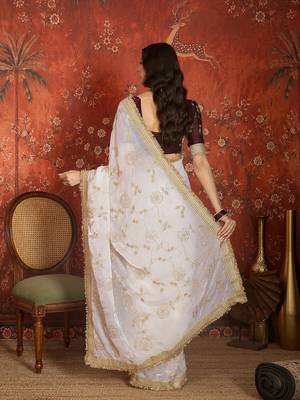 Cream tissue satin embroidered sequin saree with unstitched blouse piece. 4