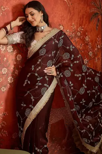 Maroon tissue satin embroidered sequin saree with unstitched blouse piece.