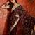 Maroon tissue satin embroidered sequin saree with unstitched blouse piece.