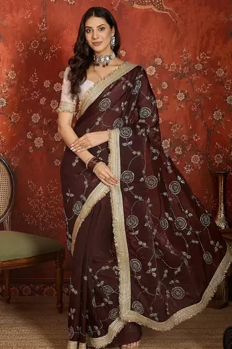 Maroon tissue satin embroidered sequin saree with unstitched blouse piece.