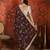 Maroon tissue satin embroidered sequin saree with unstitched blouse piece.