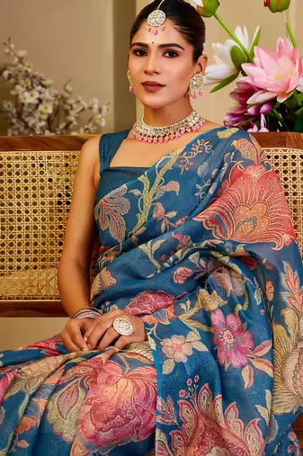 Blue shimmer printed zari saree with unstitched blouse piece.