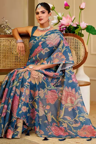 Blue shimmer printed zari saree with unstitched blouse piece.