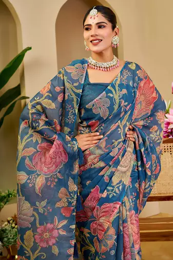 Blue shimmer printed zari saree with unstitched blouse piece.