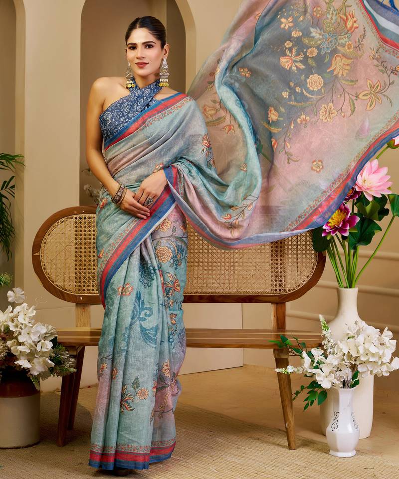 Blue shimmer printed zari saree with unstitched blouse piece.