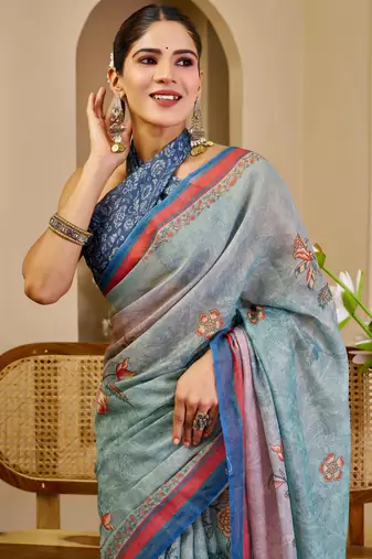 Blue shimmer printed zari saree with unstitched blouse piece.