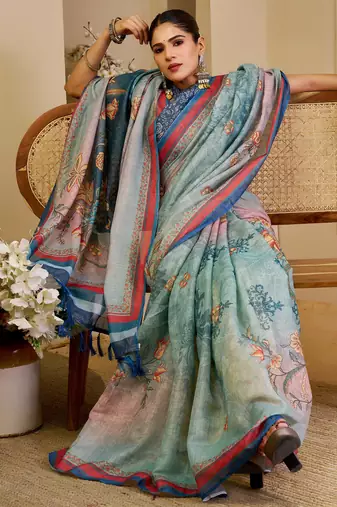 Blue shimmer printed zari saree with unstitched blouse piece.