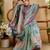 Blue shimmer printed zari saree with unstitched blouse piece.
