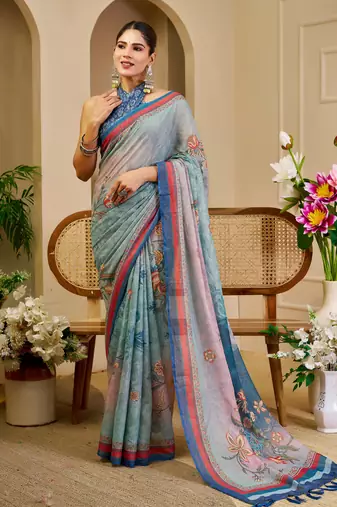 Blue shimmer printed zari saree with unstitched blouse piece.
