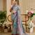 Blue shimmer printed zari saree with unstitched blouse piece.