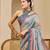Blue shimmer printed zari saree with unstitched blouse piece.