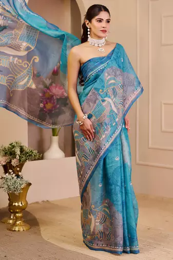 Blue shimmer printed zari saree with unstitched blouse piece.