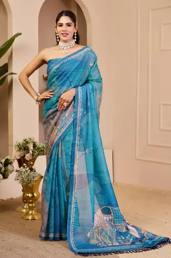 Blue shimmer printed zari saree with unstitched blouse piece.