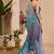 Blue shimmer printed zari saree with unstitched blouse piece.